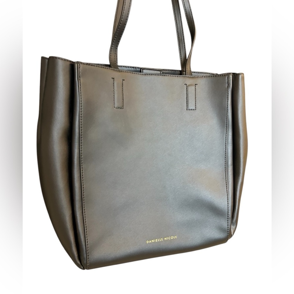 Danielle Nicole NWOT leather medium tote. Small interior stains manufacturer